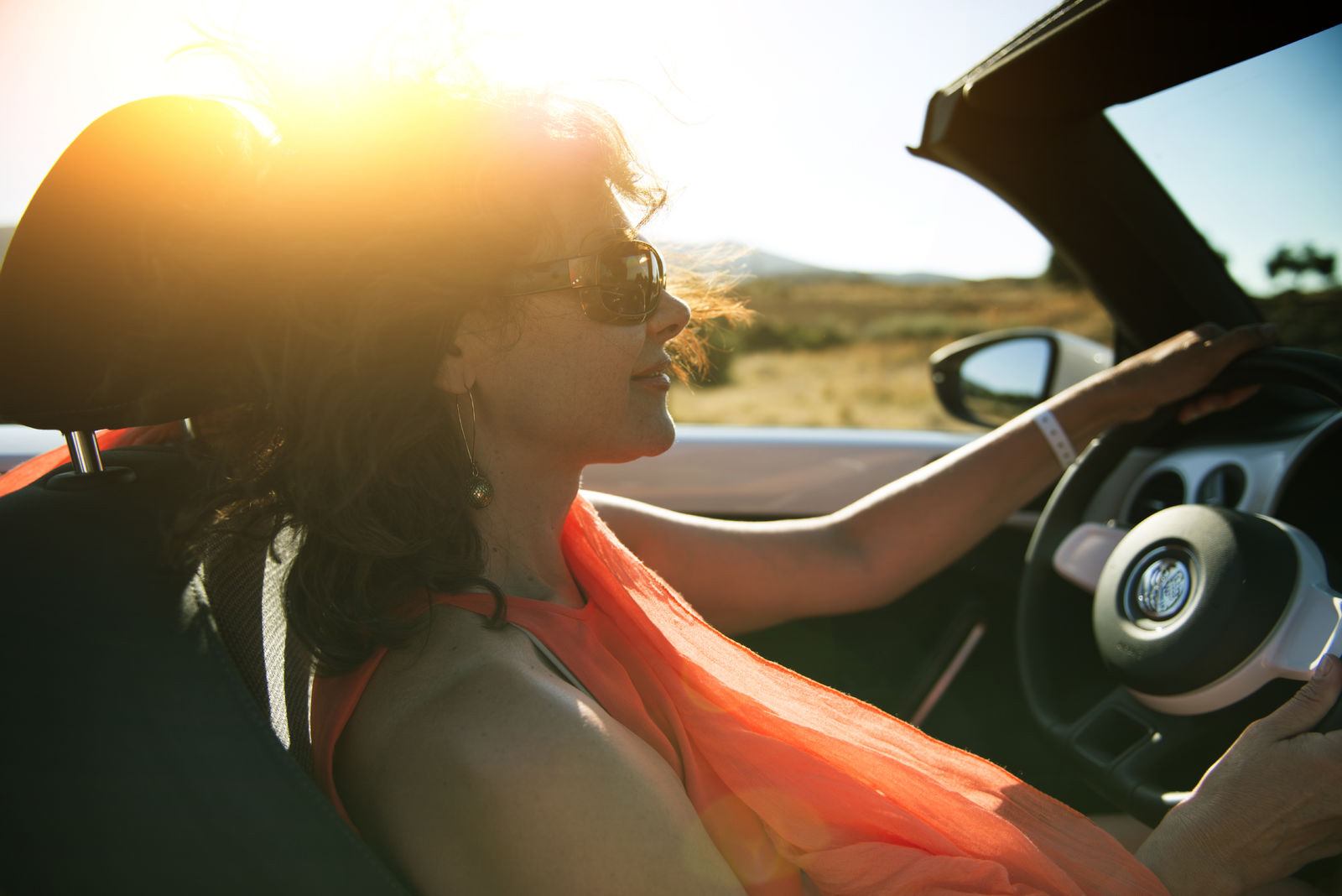 dfb woman convertible sunset